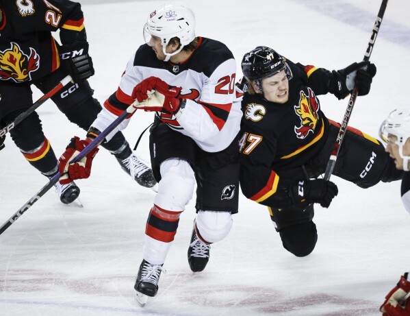 Hischier scores twice Devils beat Flames 4 2 for 3rd straight